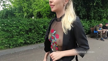 Public walk in transparent t-shirt in peak hour